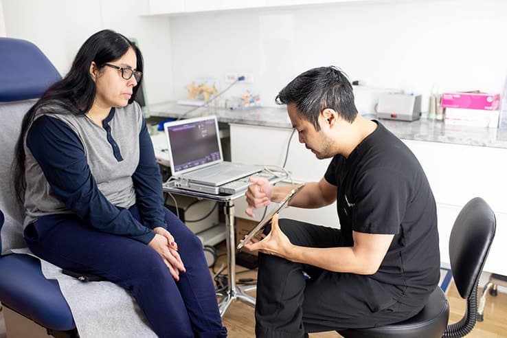 Dr-Michael-with-Patient (1)